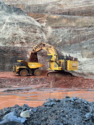 Mining machines working on mine site
