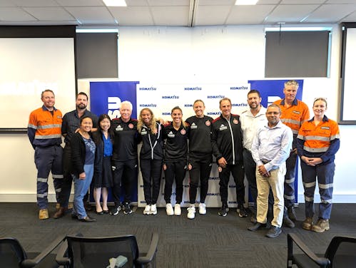 Western Sydney Wanderers Women's players with Komatsu employees